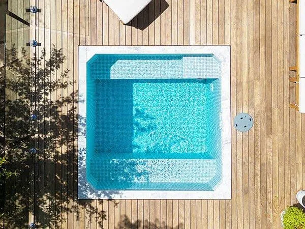 The Zen square plunge pool viewed from above on a deck