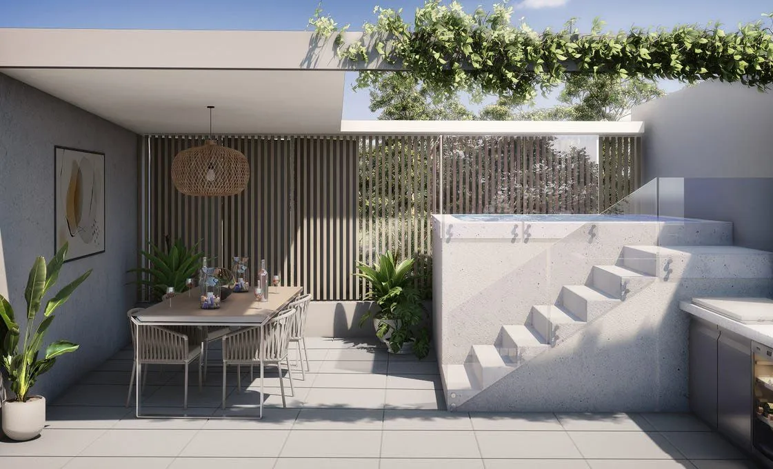 Raised square plunge pool with steps beside a covered outdoor dining area